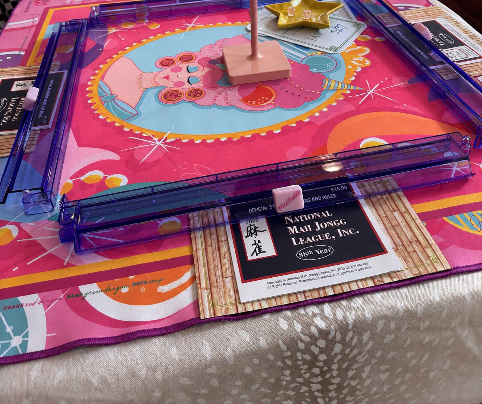 The National Mah Jongg League card on a printed mat