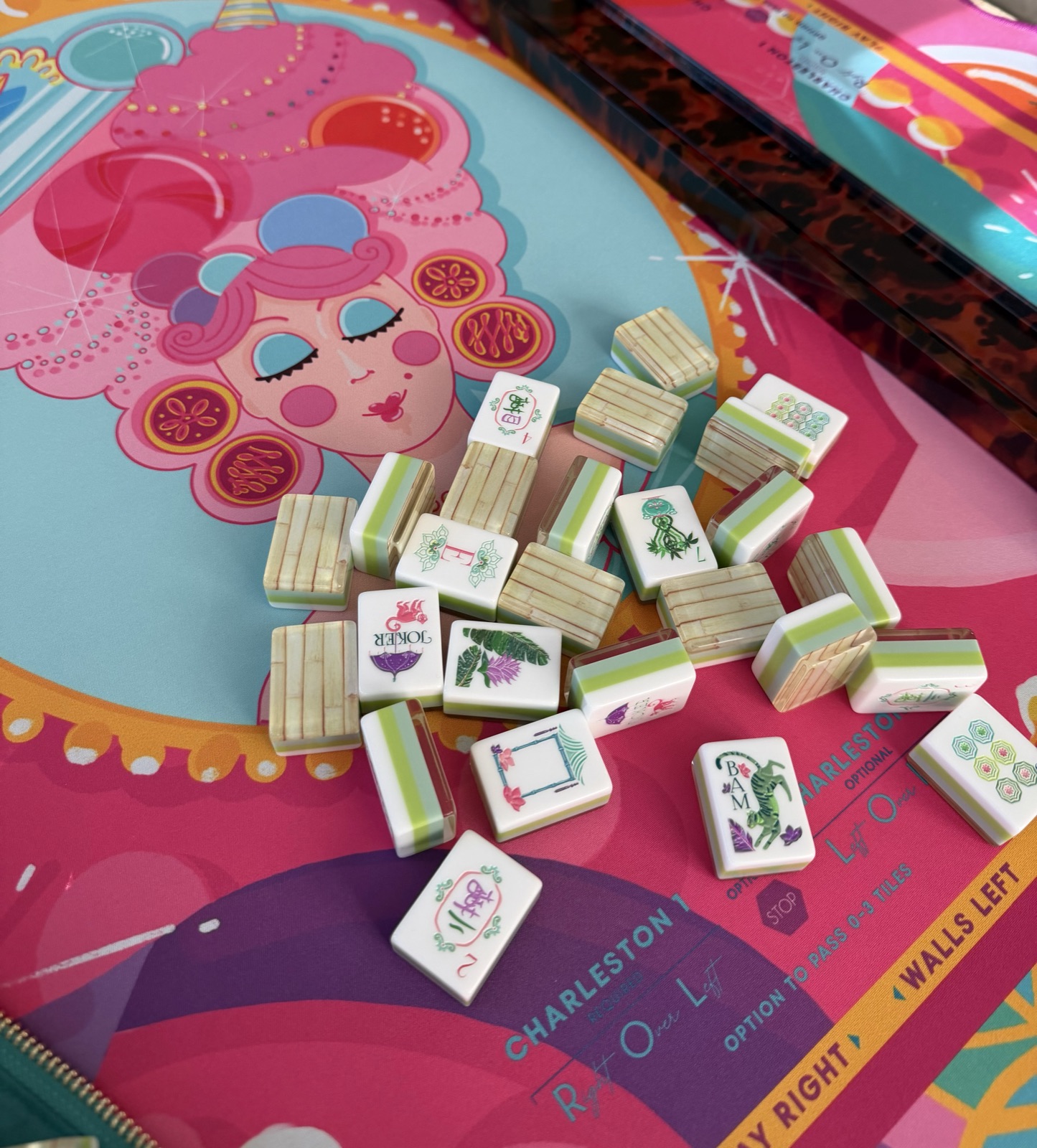 Tiles on a bright illustrated mat