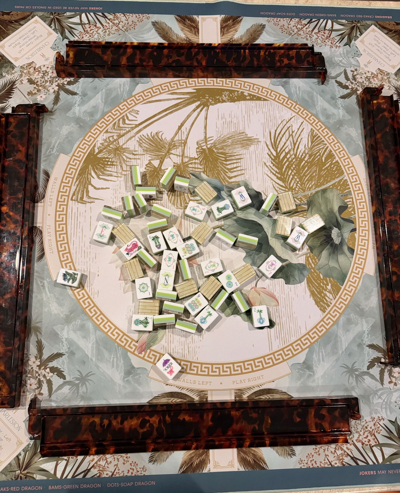 A complete set laid out with racks on a printed mat