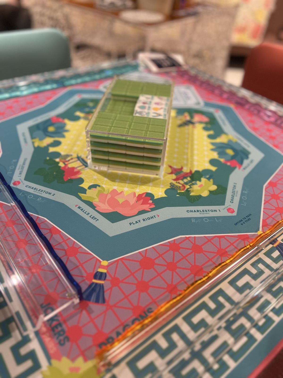 A built tile wall on a colorful printed mat